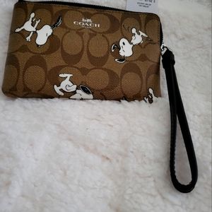 Coach limited edition Peanuts Snoopy wristlet